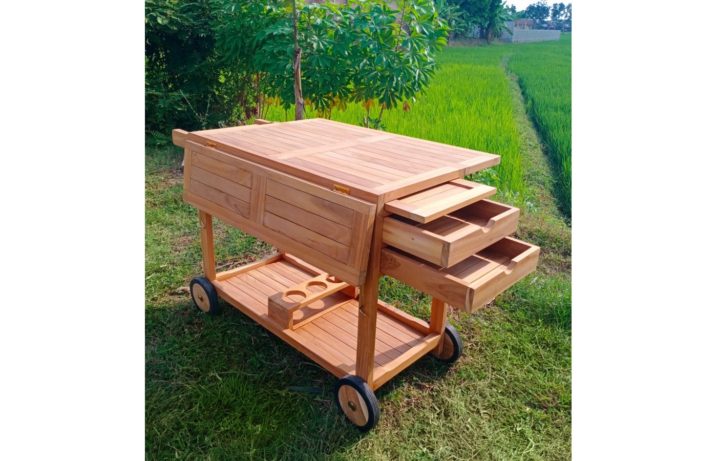 A two-level garden teak bar