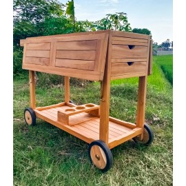 A two-level garden teak bar