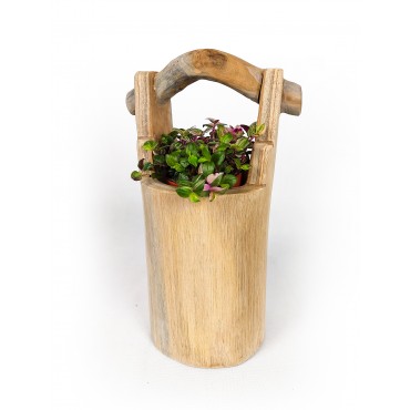 A hand-carved flower pot -...
