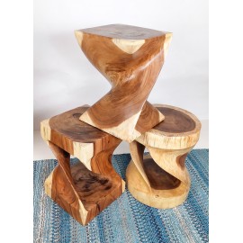 A round stool made of Suar wood