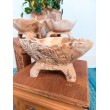 Wooden bowl on three legs with carvings