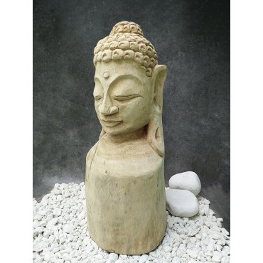 A hand-carved figure of the...