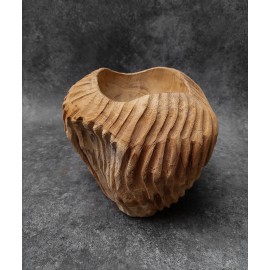 Teak wood bowl of irregular shell shape