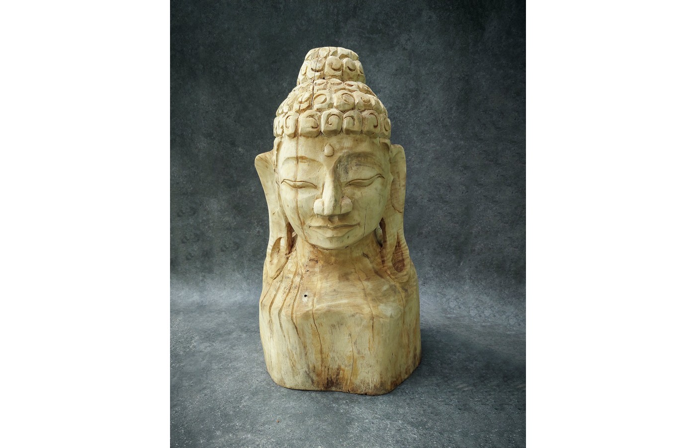 A hand-carved figure of the Buddha in teak wood, 80 cm