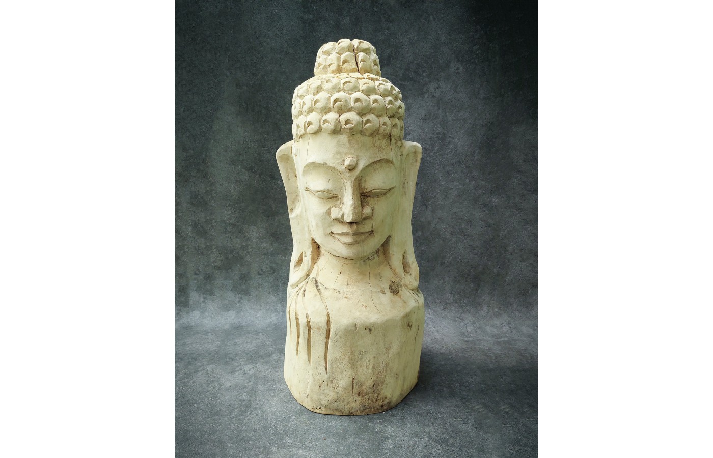 A hand-carved figure of the Buddha in teak wood, 80 cm