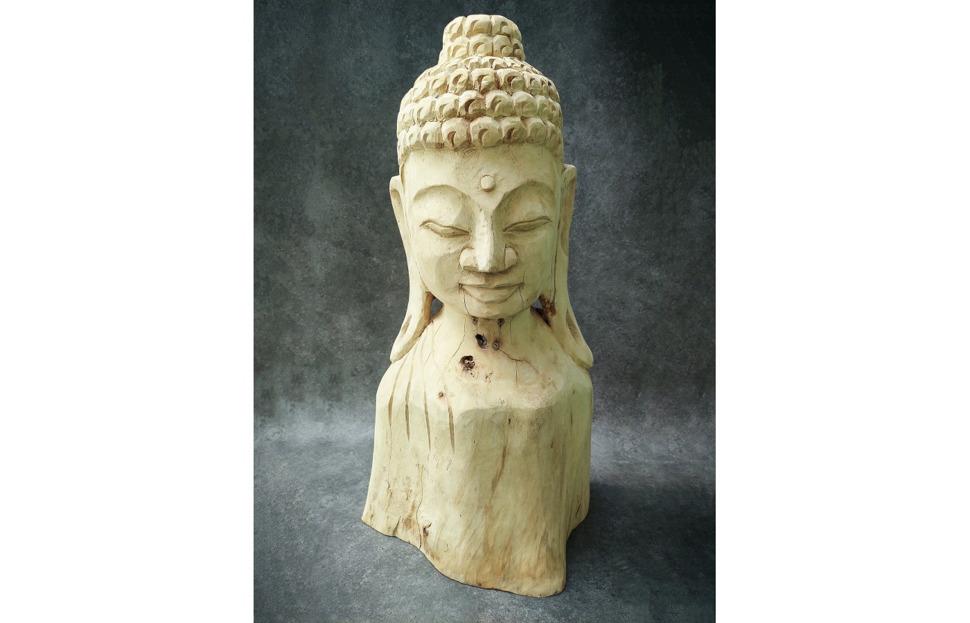 A hand-carved figure of the Buddha in teak wood, 80 cm