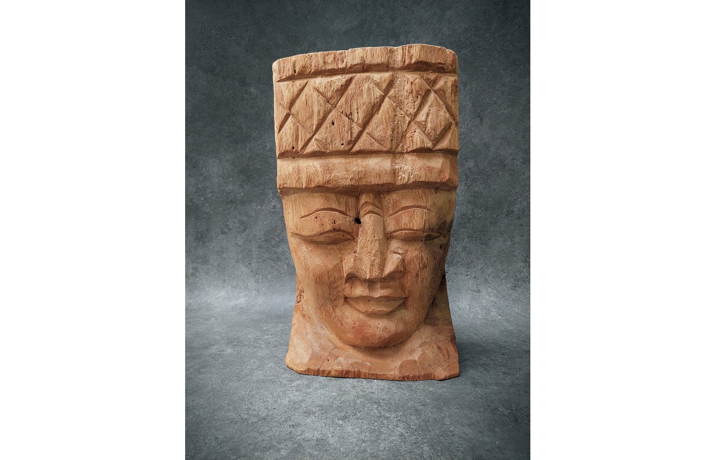 A large garden sculpture Head, teak wood