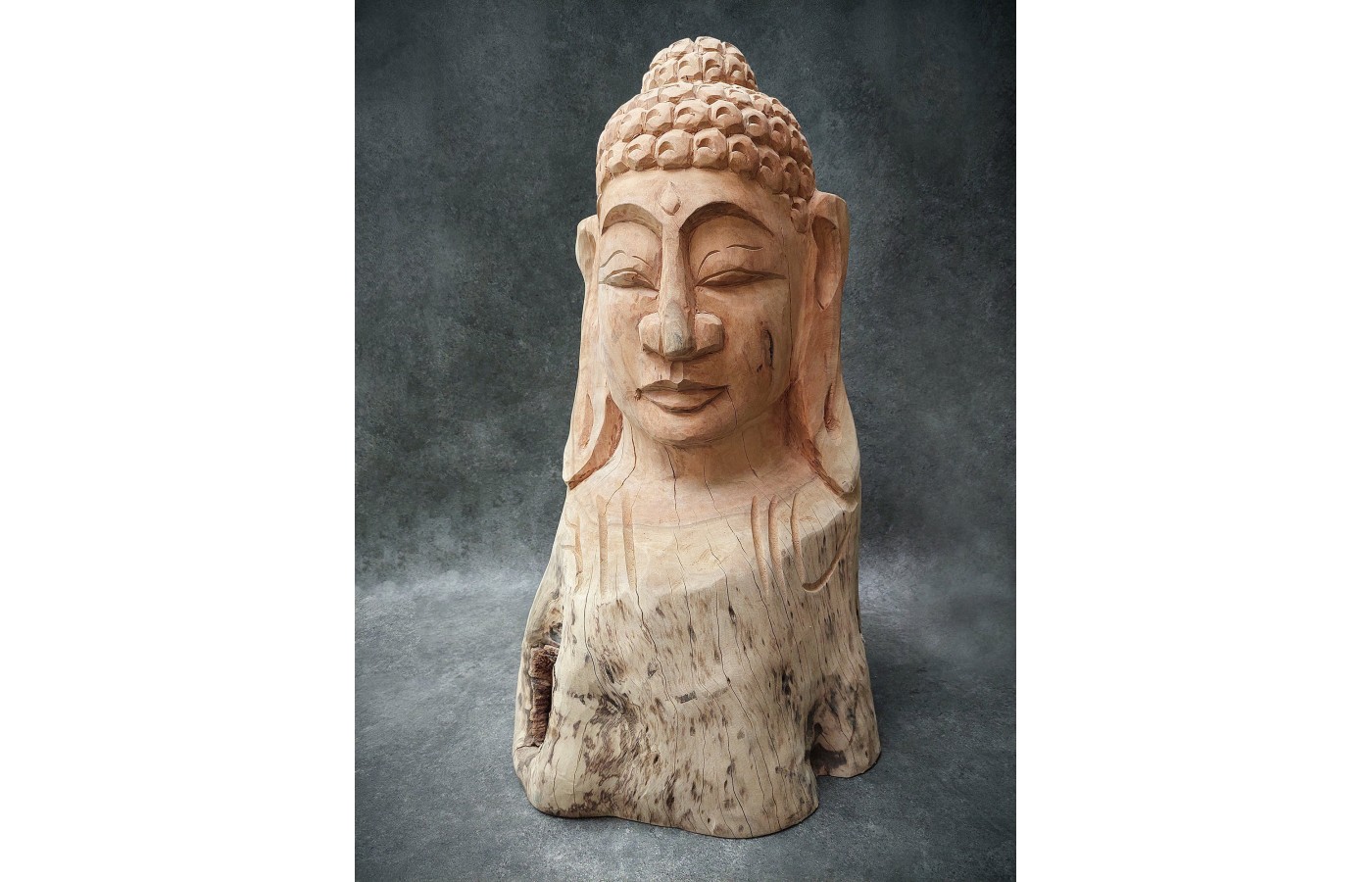 A hand-carved figure of the Buddha in teak wood, 80 cm