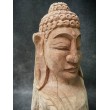 A hand-carved figure of the Buddha in teak wood, 80 cm