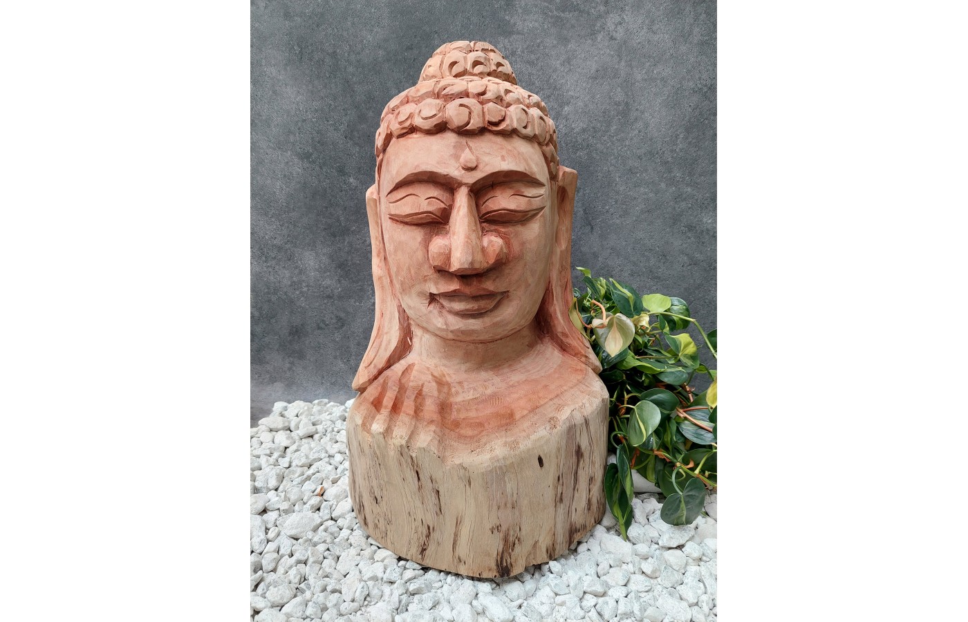 A hand-carved figure of the Buddha in teak wood, 80 cm